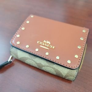 Coach - Small Trifold Wallet In Colorblock Signature Canvas With Rivets